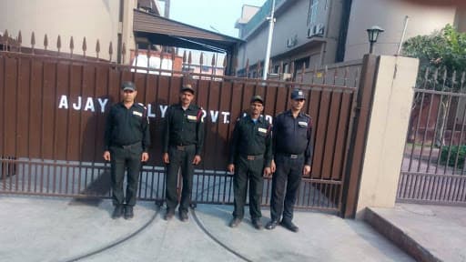 Four guards at an industrial client's gate