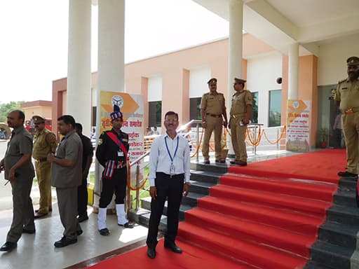 Omax guards lining a red-carpeted entrance at a client's premises